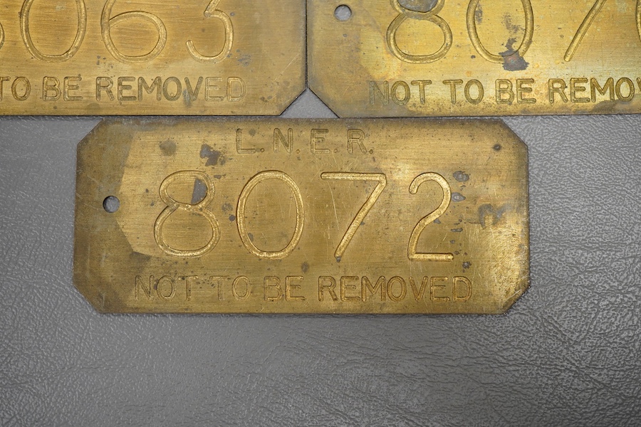 Five brass LNER engraved railway locomotive plates; ‘Not To Be Removed’, locomotive numbers; 8056, 8063, 8069, 8070, and 8072, each 11.8 x 5cm